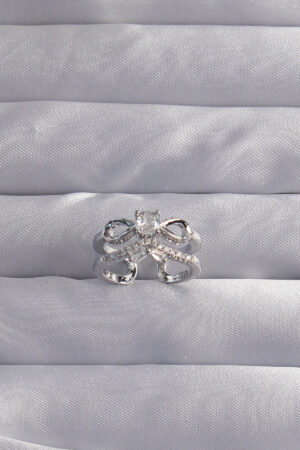 Pirinç Ayarlamalı Gümüş Renk Zirkon Taşlı 2li Görünüm Fiyonk Yüzük