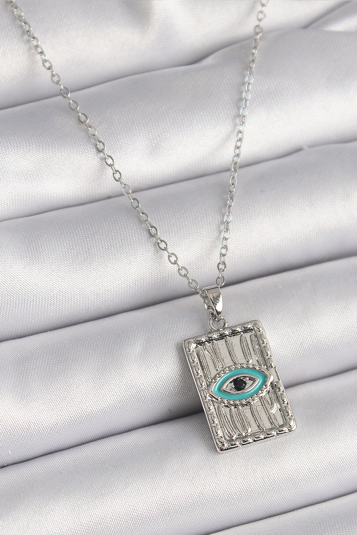 316L Çelik Gümüş Renk Zirkon Taşlı Göz İşleme Detaylı Plaka Model Kadın Kolye