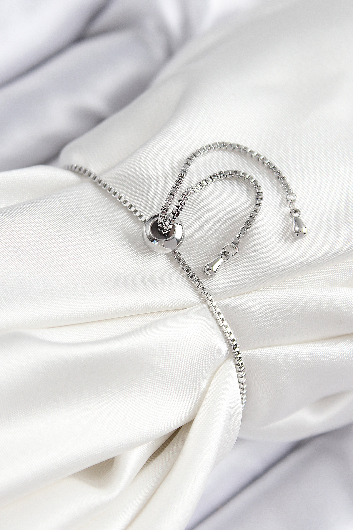 Pirinç Zirkon Taşlı X Detaylı Su Yolu Model Gümüş Renk Asansörlü Kadın Bileklik - Görsel 2