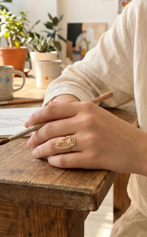 Pirinç Gold Renk Picasso Tarzı Tek Çizgi Yüz Model Kadın Yüzük