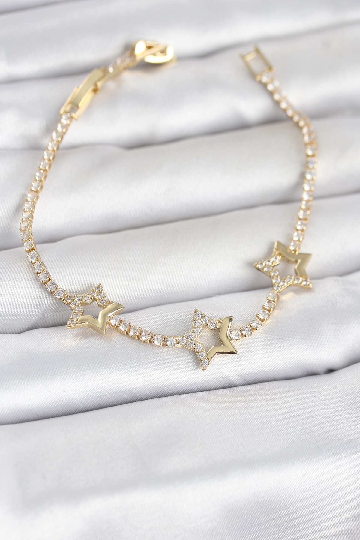 Pirinç Gold Renk Yıldız Model Zirkon Taşlı Su Yolu Kadın Bileklik